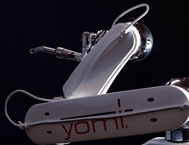 The arm for the Yomi robotic assistant is shown. For the Yomi robotic dentistry services landing page.