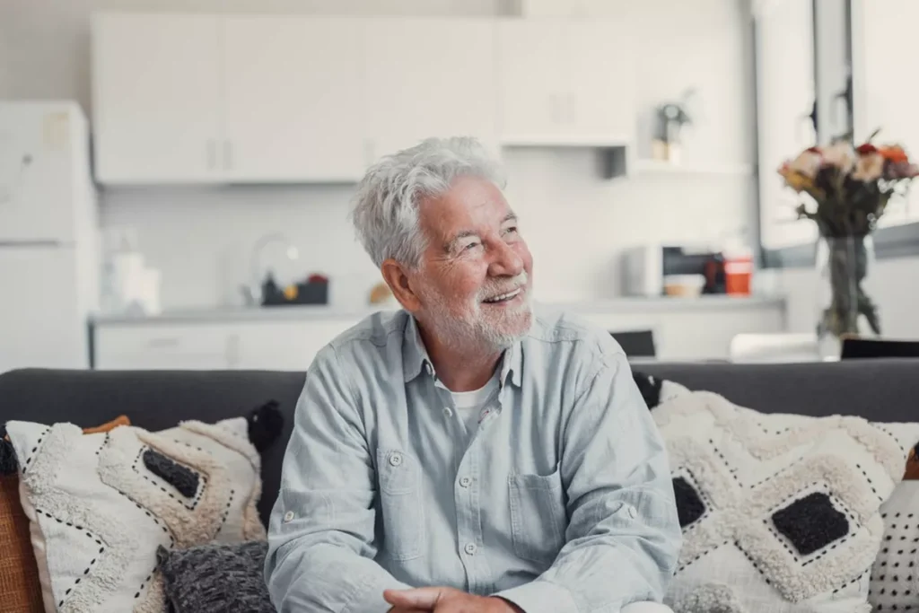 A senior man with good teeth.